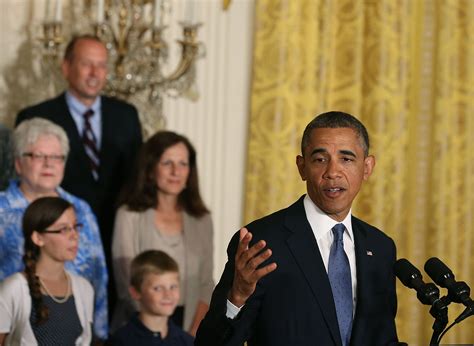 Obamacare "doing what it's designed to do," president says - CBS News 