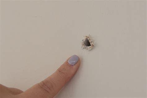 how to fix small holes in drywall 8