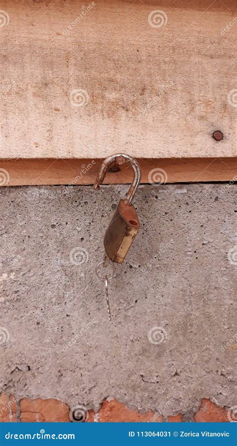 gate lock key stock image image  rusty gate