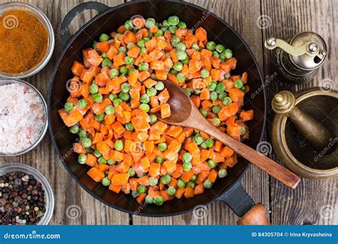 Frozen Peas And Carrots For Cooking On A Pan Stock Photo Image Of