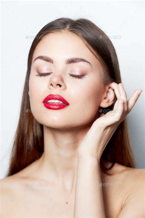 Attractive Woman Clear Skin Naked Shoulders Closed Eyes Red Lips Charm Stock Photo By Shotprime