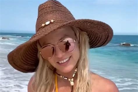 Britney Spears Sizzles In Tiny Yellow Bikini As She Enjoys Beach