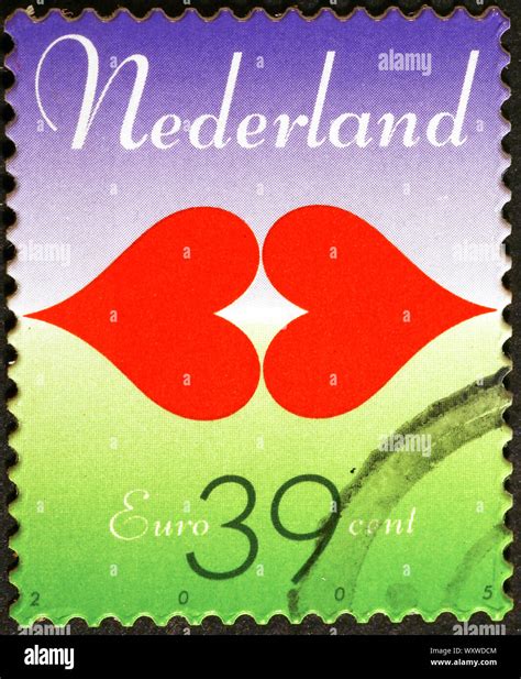 Two Hearts On Dutch Postage Stamp Stock Photo Alamy