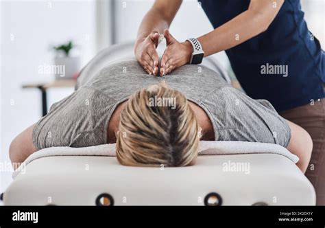Your Back Needs All The Relief It Can Get Shot Of A Mature Woman Lying Face Down And Getting