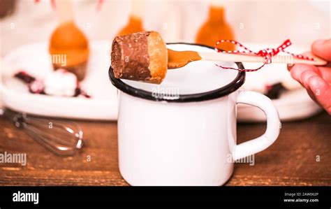 Salted Caramel Hot Cocoa Spoons In Metal Cup Stock Photo Alamy