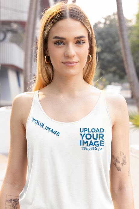 Placeit Mockup Of A Tattooed Woman Wearing A Bella Canvas Tank Top