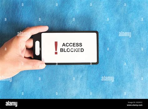 hand holding  mobile phone  restricted site  website blocked
