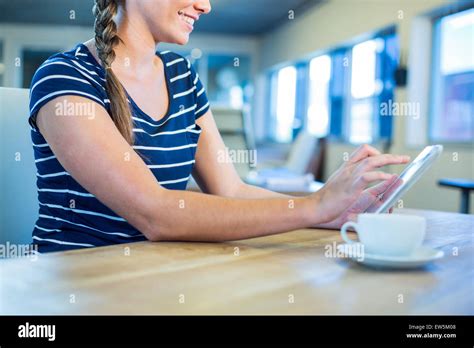 Smiling Brunette Using Tablet Stock Photo Alamy