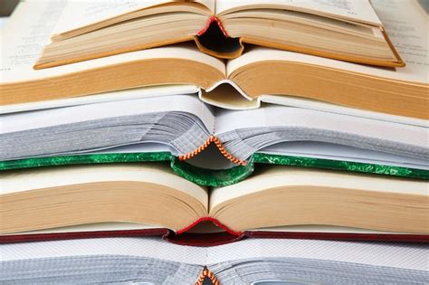 Premium Photo Pile Of Open Books