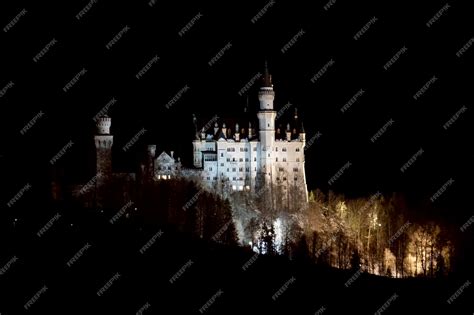 Premium Photo | Neuschwanstein castle at night in winter