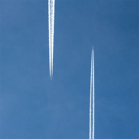 Premium Photo Low Angle View Of Airplane Flying In Sky