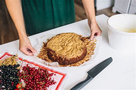 Mother And Daughter Baking A Delicious Naked Cake By Stocksy Contributor Peter Meciar Stocksy