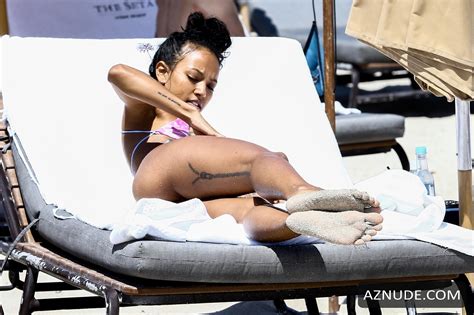 Karrueche Tran Sexy In A Skimpy Pink Bikini While Enjoying A Beach Day In Miami With Her NFL