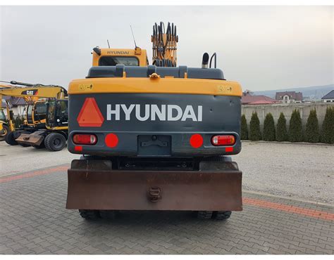 Hyundai R 140 W - Maszyny Budowlane Sprzedaż