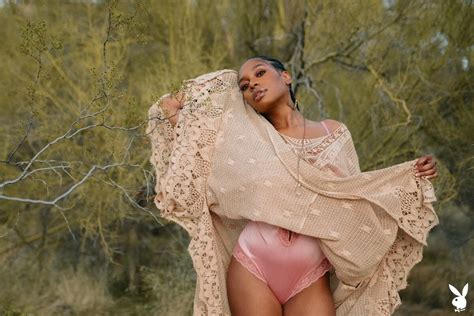 Nyla Removes Her Pink One Piece Lingerie Outdoor For Playboy