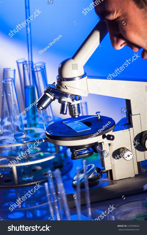 Man Looking Into Ocular Microscope Doing Stock Photo 223959022