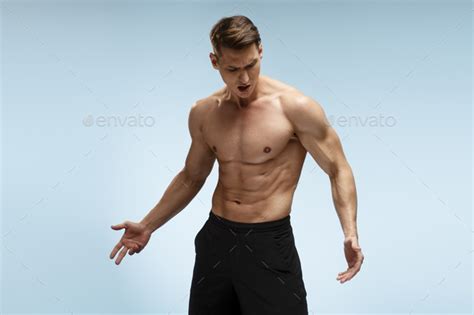 Portrait Of Masculine Proud Confident Muscular Man With Naked Nude Torso Stock Photo By SkloStudio