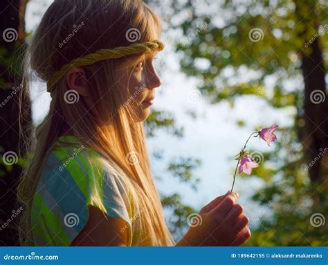 Portrait Of A Blonde Girl With Blue Eyes At Sunset In The Backlight Stock Image Image Of Face