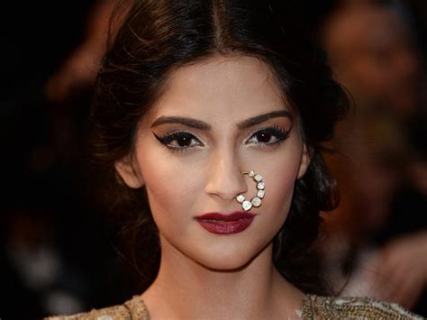 Sonam Kapoor Shines In Nude Gown At Cannes