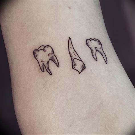 Tooth tattoo meaning: history, photo drawings, sketches, facts