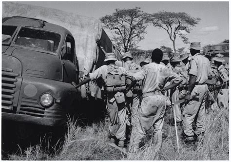 Members Of 4th Uganda Battalion Kings African Rifles Next To A