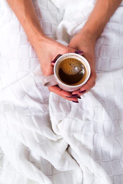 Premium Photo Hands Holding Hot Cup Of Coffee