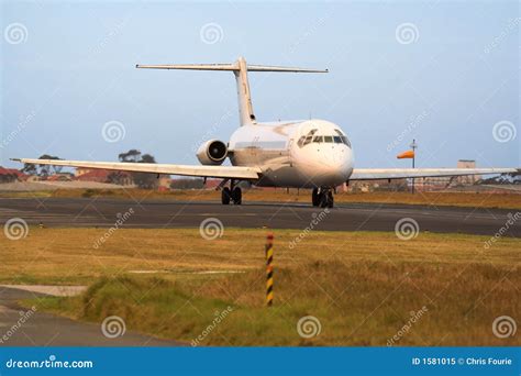 Passenger Jetliner stock image. Image of taxing, landing - 1581015