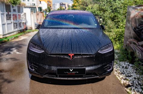Vilner Acts As Santa Claus Delivers A Fine Tesla Model X Right Before