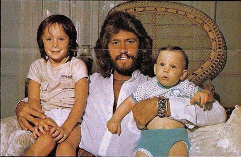 Barry loves his kids....you can see it on his face. | Barry gibb ...