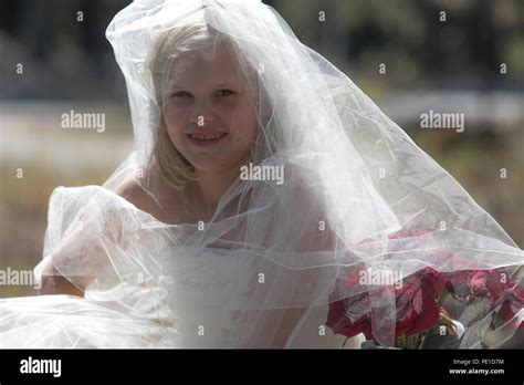 Fantasy Year Attractie Blonde Wearing Aunt S Wedding Dress Veil Sitting Outdoors On