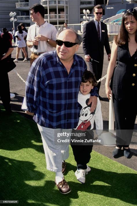 American actor and filmmaker Danny DeVito, with his son, attends the