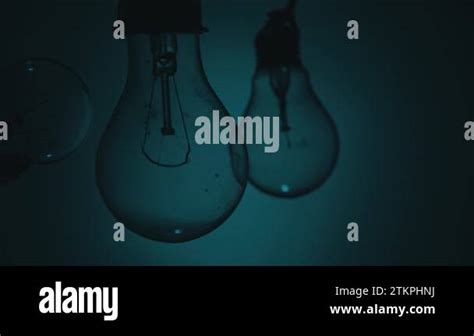 Light bulb turns on and goes out at the touch of a persons hand in the ...