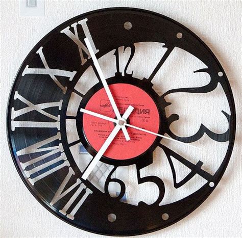 Laser Cut Cool And Unique Vinyl Wall Clock Keyframes X Free Vector