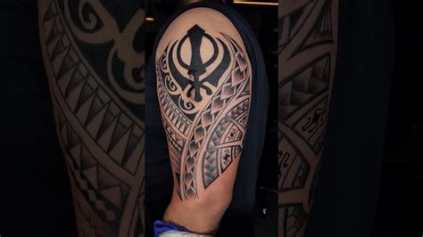 Khanda With Lion Tattoo Designs