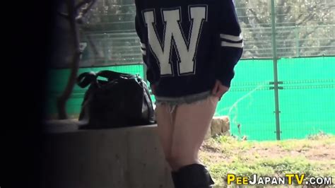 Naked Asian Babe Squats And Urinates