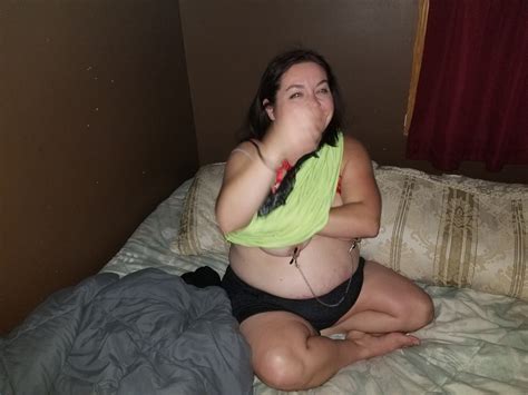 Brunette BBW Stripping Down And Showing Her Boobies Photos