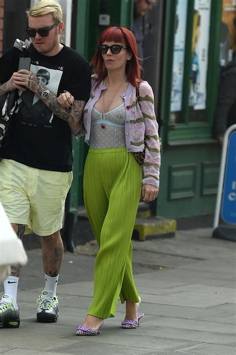 Braless Lily Allen Shows Off Her New Boob Job In A See Through Blue Mesh Top While Celebrating