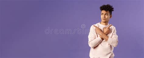 Portrait Of Troubled Indecisive Handsome Young Man Facing Difficult