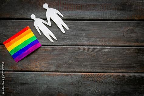 Gay Pride Rainbow LGBT Flag With Men Couple Paper Shapes LGBT Social Rights Concept Photos