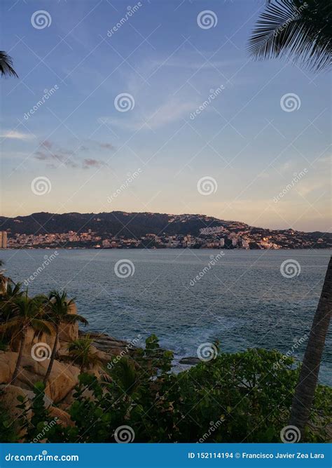 Tropical Landscape of Acapulco Beach, Mexico in the Evening Stock Photo