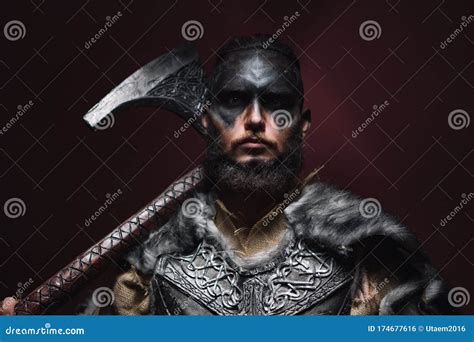 Portrait Of A Viking Man With An Axe A Man Of Years Holds A Large