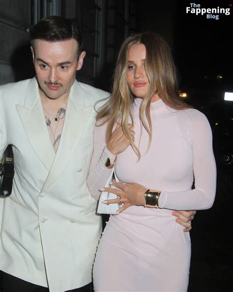 Rosie Huntington Whiteley Displays Her Tits Butt In A See Through Pink Dress Photos