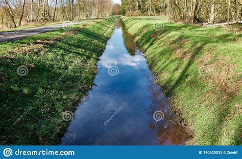 Drainage Ditch To Drain The Moor Area With Embankments With Grass Stock Image Image Of Slope