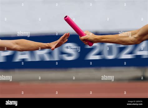 Men Relay Race In Background Banner Paris Stock Photo Alamy