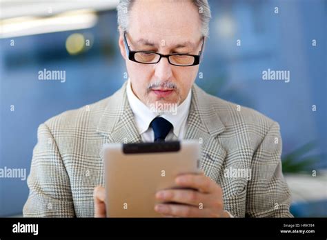 Mature Businessman At Work In The Office Stock Photo Alamy