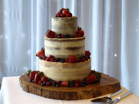 Semi Naked Wedding Cake With Fresh Berries