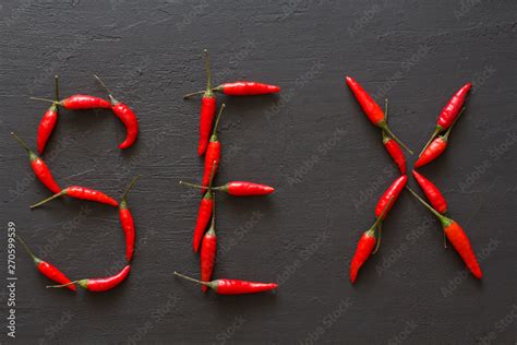 Word Sex Red Hot Chili Peppers On Black Background On Black Table Swx Letter Arranged From Red