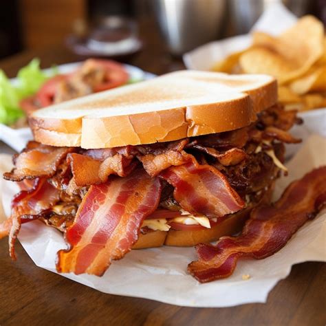 Premium Photo | A tasty crispy bacon sandwich