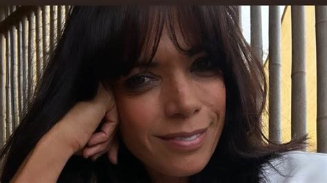 Jenny Powell Strips Down To A Skimpy Coral Bikini As She Braves A
