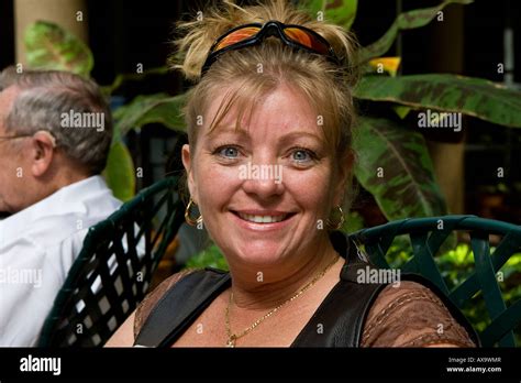 Blonde Woman Smiling Stock Photo Alamy